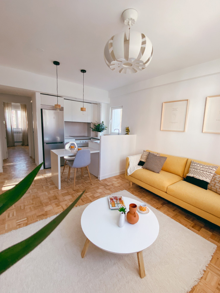 Medium sized scandinavian living room in Madrid.
