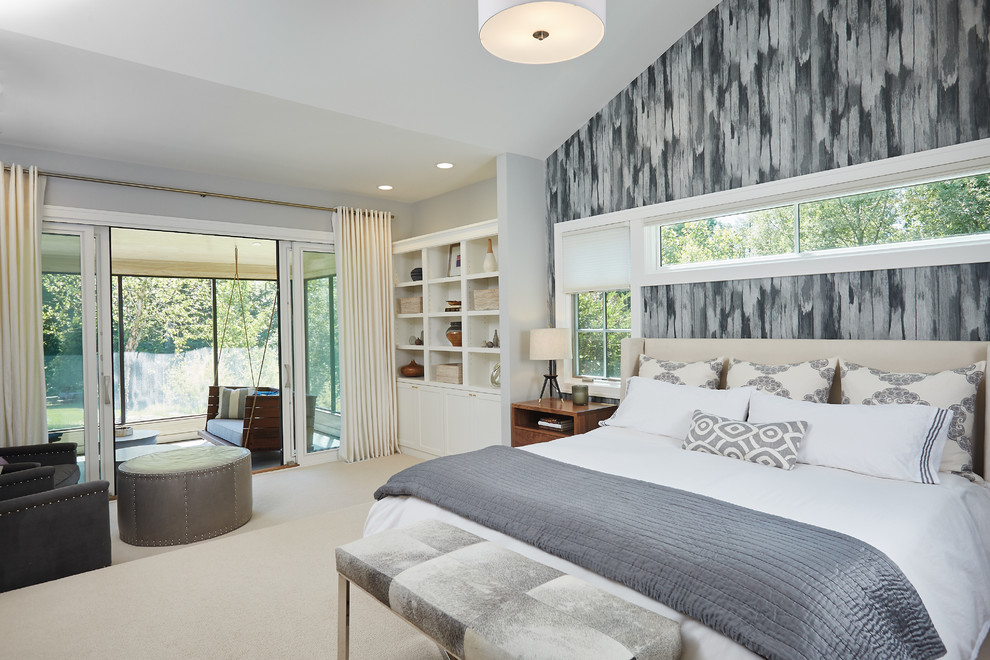 Inspiration for a large contemporary master bedroom in Grand Rapids with grey walls and carpet.