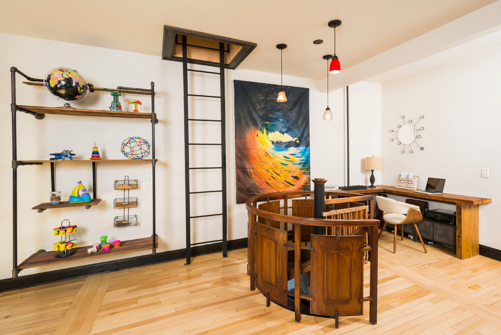 Mid-sized eclectic study room in Other with white walls, light hardwood floors, no fireplace and a built-in desk.