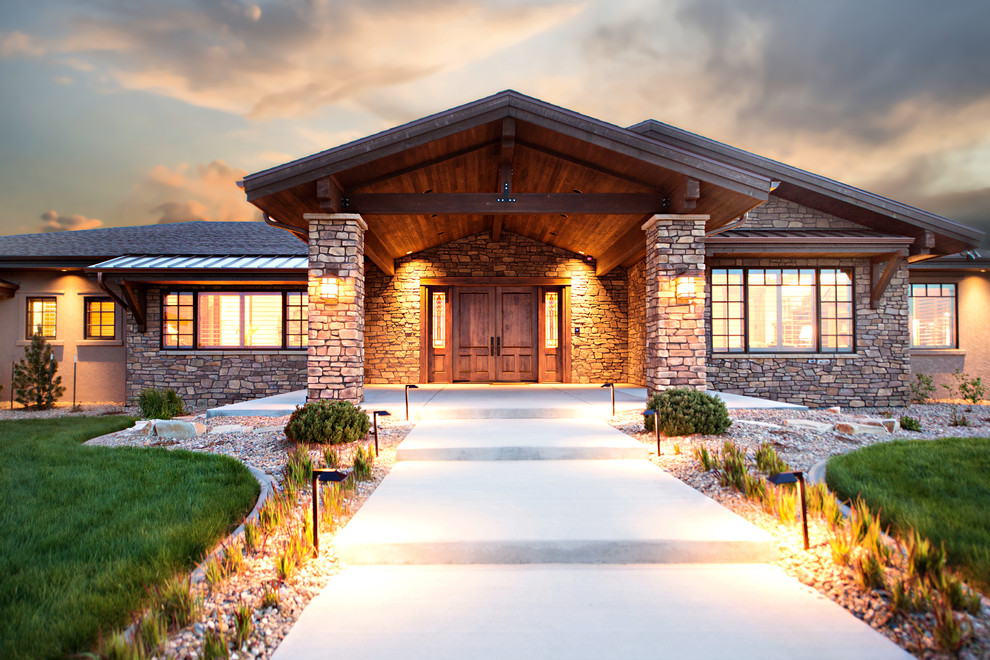 Inspiration for an expansive arts and crafts exterior in Denver.