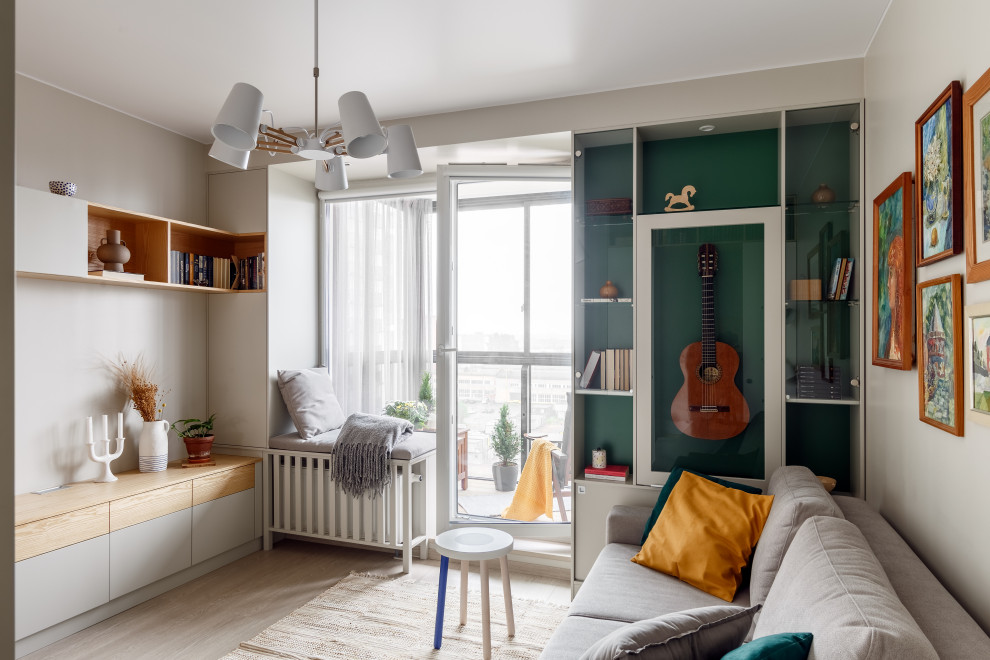 Design ideas for a scandinavian kids' bedroom in Saint Petersburg with green walls.