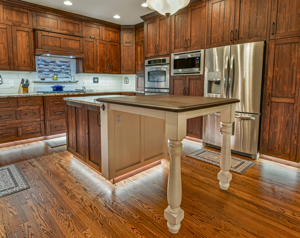 Example of a mid-sized mountain style kitchen design in Denver