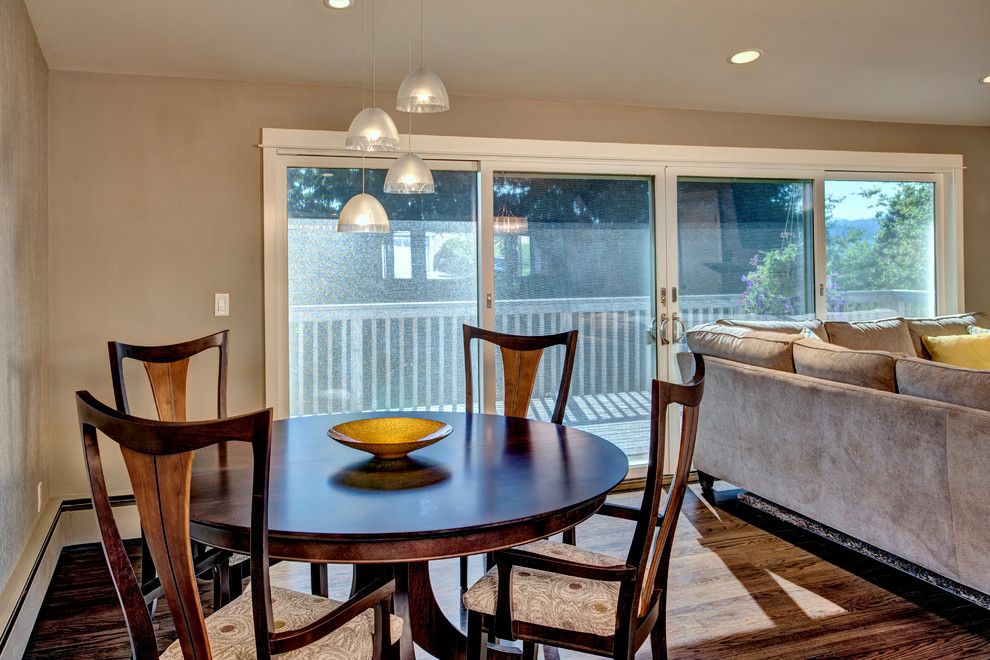 Small transitional dark wood floor kitchen/dining room combo photo in Seattle with beige walls