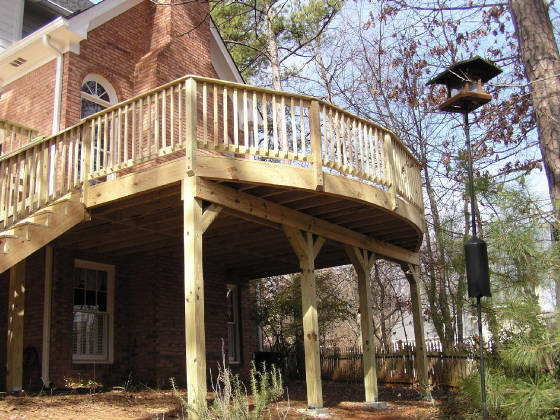 Large mountain style backyard balcony deck photo in Atlanta with no cover