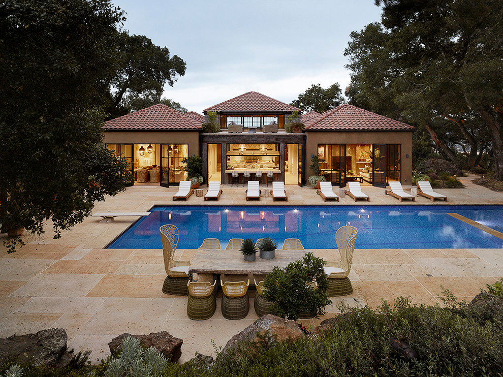 This is an example of a mediterranean backyard rectangular pool in San Francisco.
