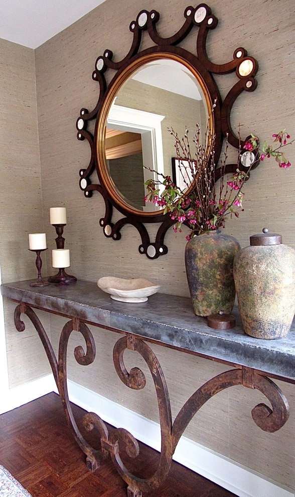 Example of a small transitional dark wood floor foyer design in Chicago