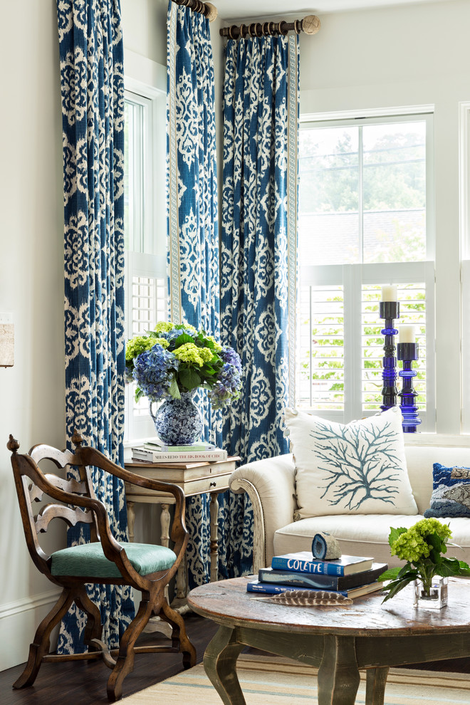 Inspiration for a coastal enclosed vinyl floor living room library remodel in Boston with white walls