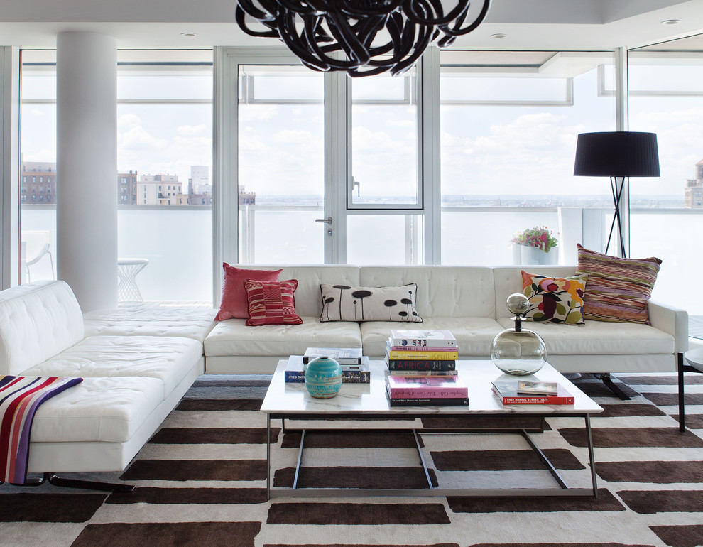 Design ideas for a contemporary open concept living room in New York.
