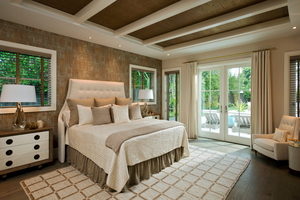 Inspiration for a master bedroom in Miami with brown walls and dark hardwood floors.