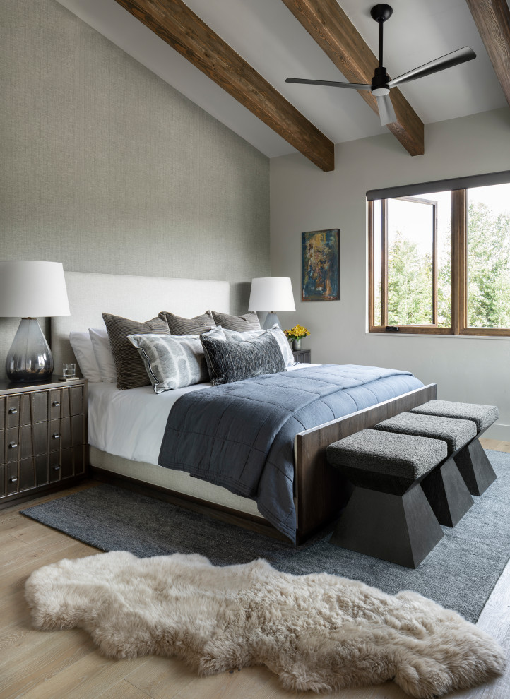 This is an example of a rustic bedroom in Denver.