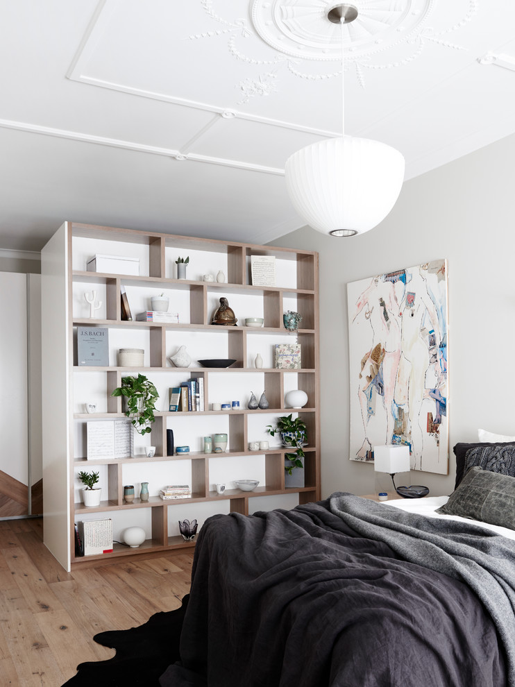 This is an example of a contemporary bedroom in Melbourne.