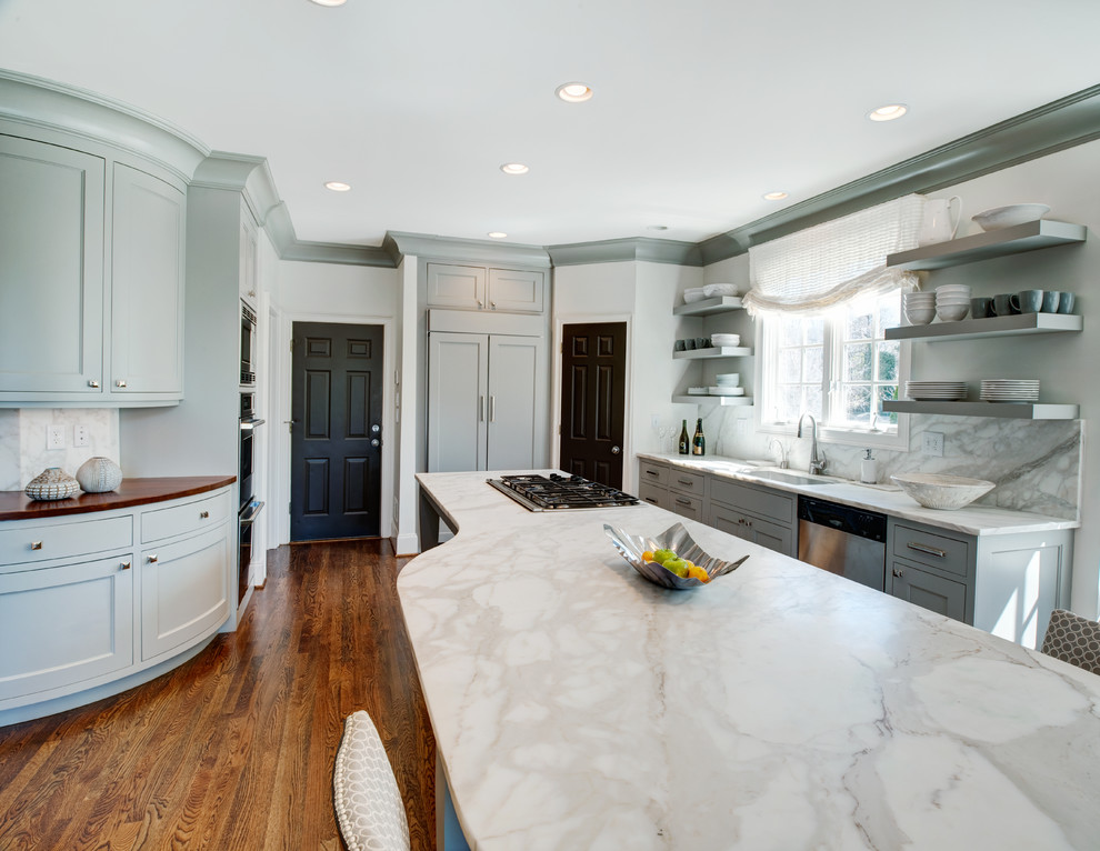 Transitional medium tone wood floor kitchen photo in Atlanta with recessed-panel cabinets, blue cabinets and an island
