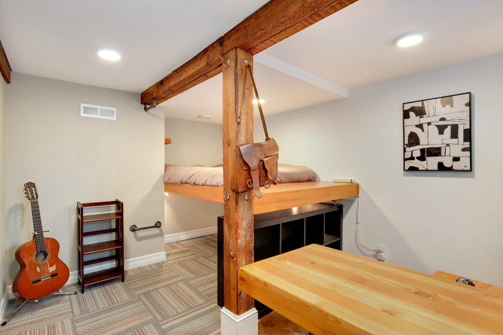Photo of a small country bedroom in Portland with grey walls, carpet and exposed beam.