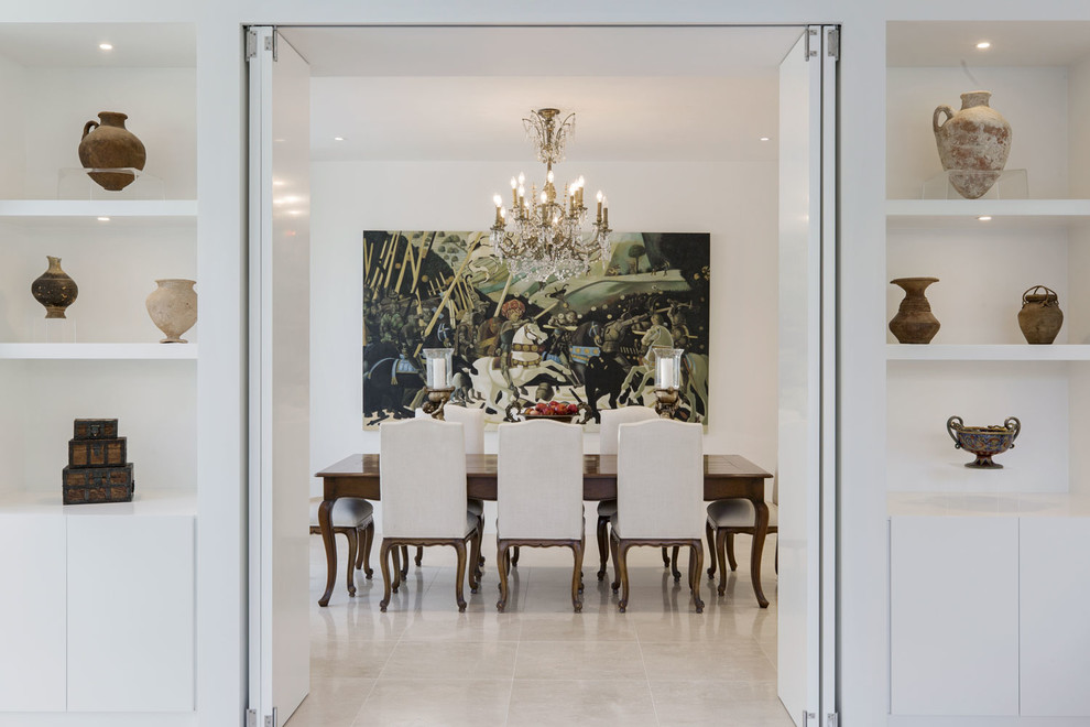 This is an example of a mid-sized contemporary separate dining room in Melbourne with white walls, marble floors and beige floor.
