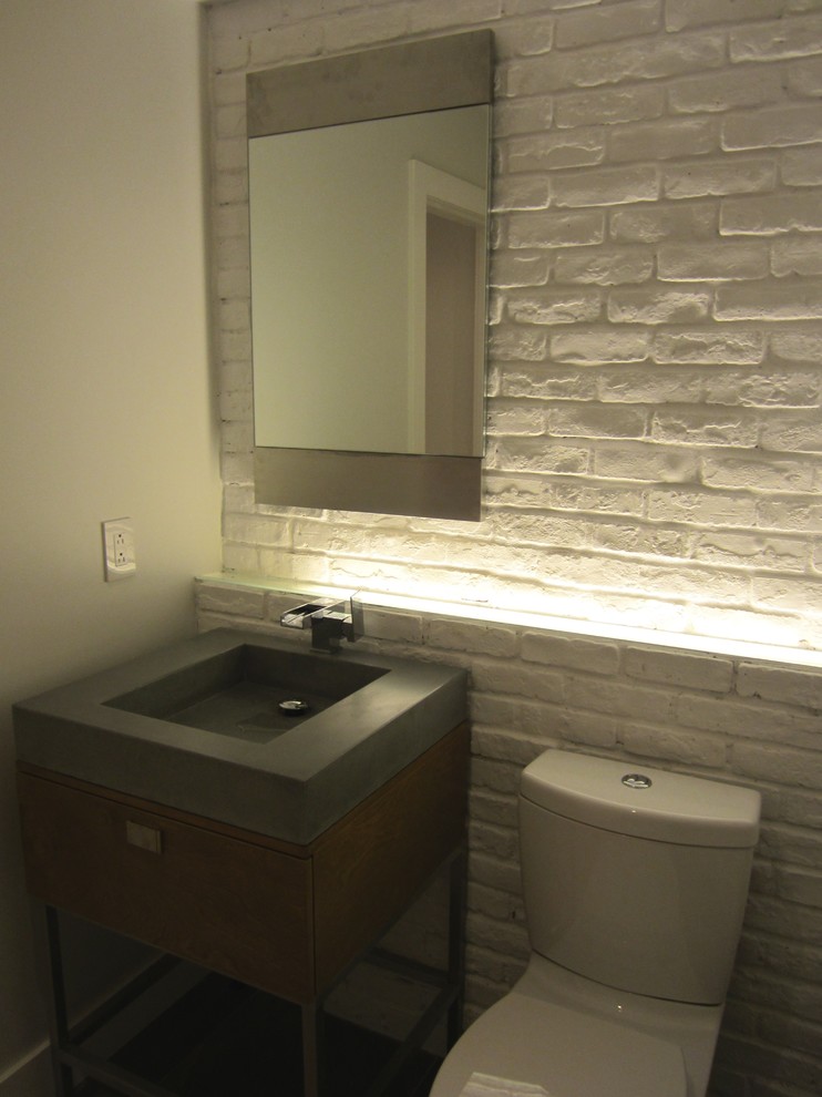Design ideas for a modern powder room in Montreal.