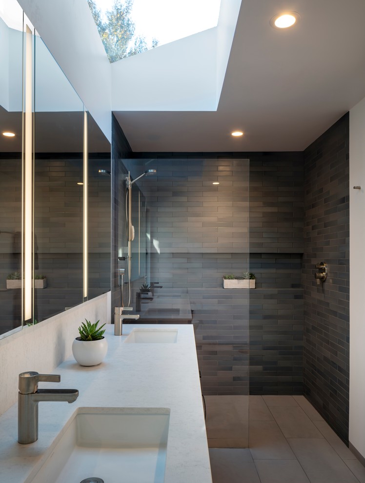 Inspiration for a large contemporary master bathroom in San Francisco with flat-panel cabinets, medium wood cabinets, a curbless shower, porcelain tile, porcelain floors, an undermount sink, engineered quartz benchtops, grey floor, an open shower and white benchtops.