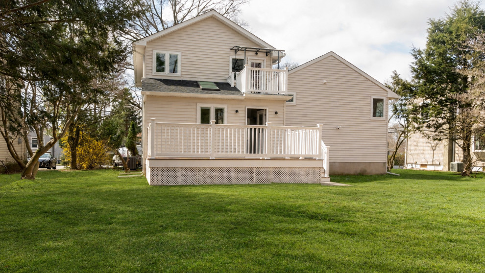 Rear Addition with Deck and Balcony