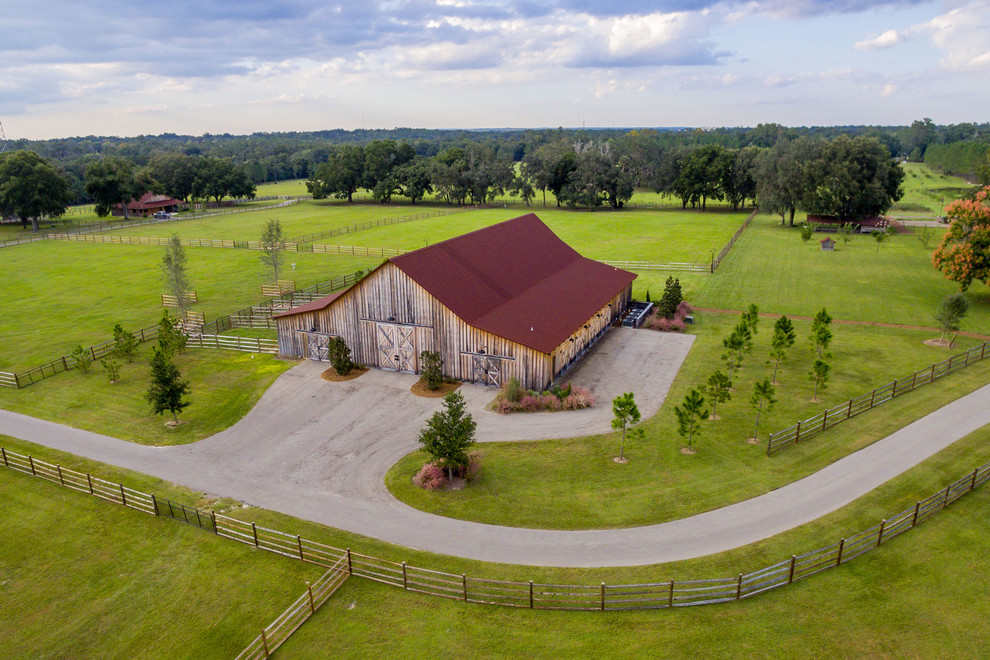 Example of a large mountain style gray one-story wood exterior home design in Orlando