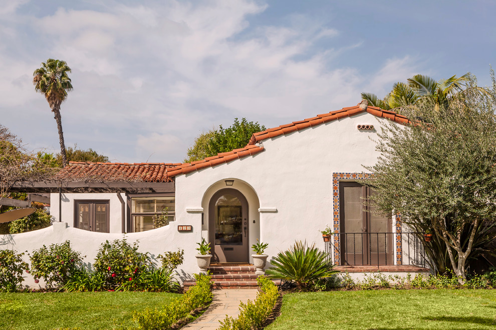Example of a small tuscan home design design in Los Angeles