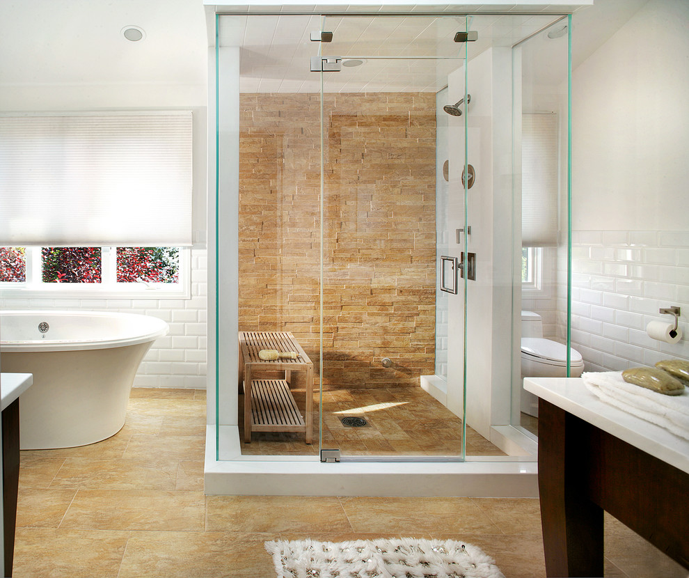This is an example of a mid-sized contemporary master bathroom in New York with an alcove shower, a console sink, furniture-like cabinets, dark wood cabinets, a one-piece toilet, white walls and ceramic floors.