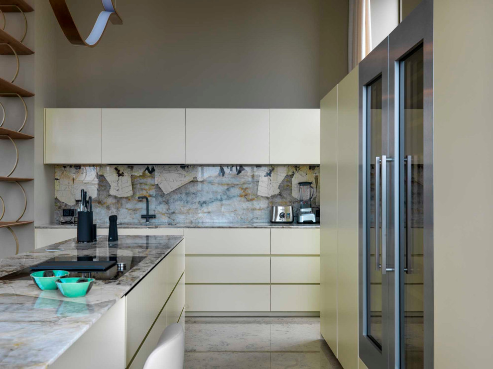 This is an example of a contemporary l-shaped kitchen in Moscow with marble benchtops, marble splashback and with island.