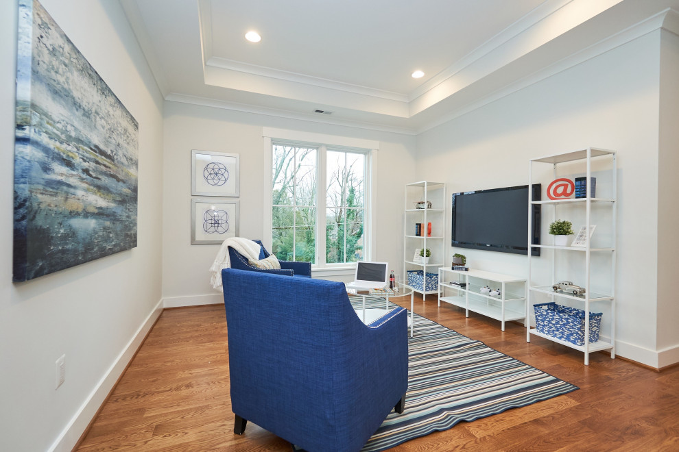Design ideas for a mid-sized transitional open concept family room in DC Metro with white walls, medium hardwood floors, no fireplace, a wall-mounted tv and brown floor.