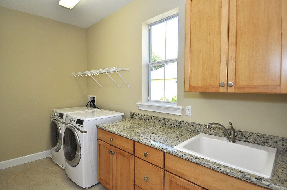 Tuscan laundry room photo in Tampa