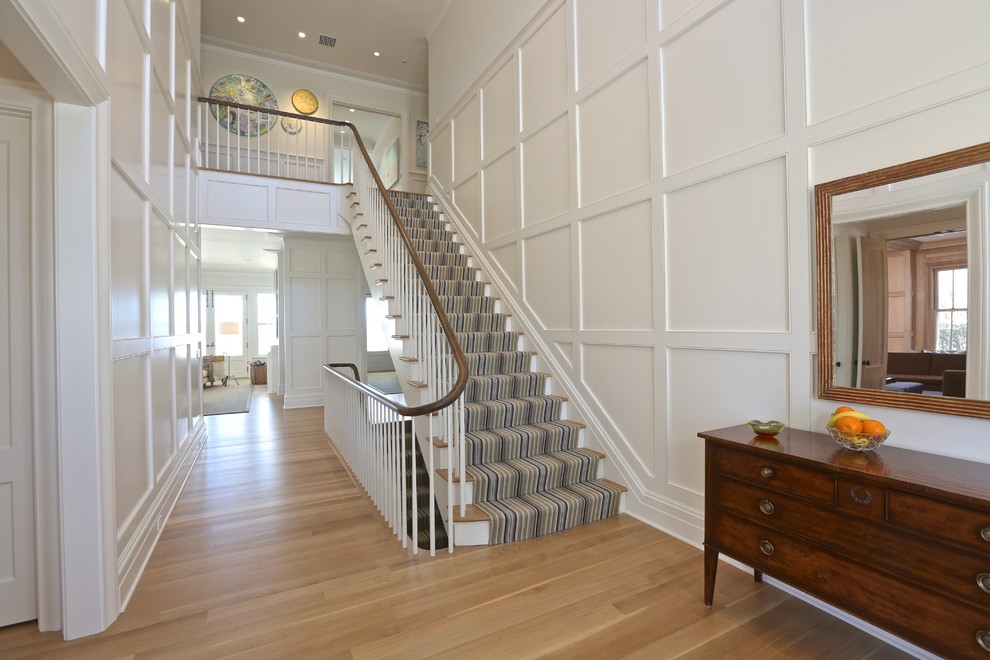 Large traditional straight staircase in New York.