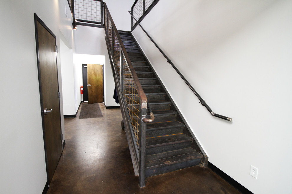 Design ideas for a contemporary metal straight staircase in Birmingham with metal railing.