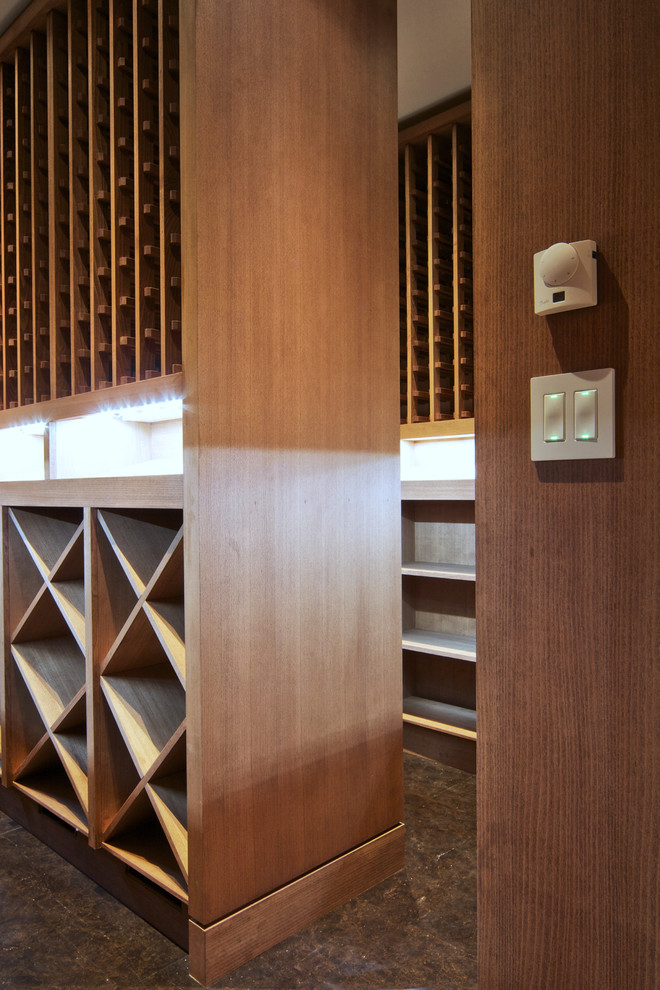 Photo of a contemporary wine cellar in Vancouver.