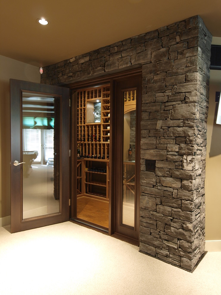 Mid-sized contemporary wine cellar in Calgary with diamond bins.