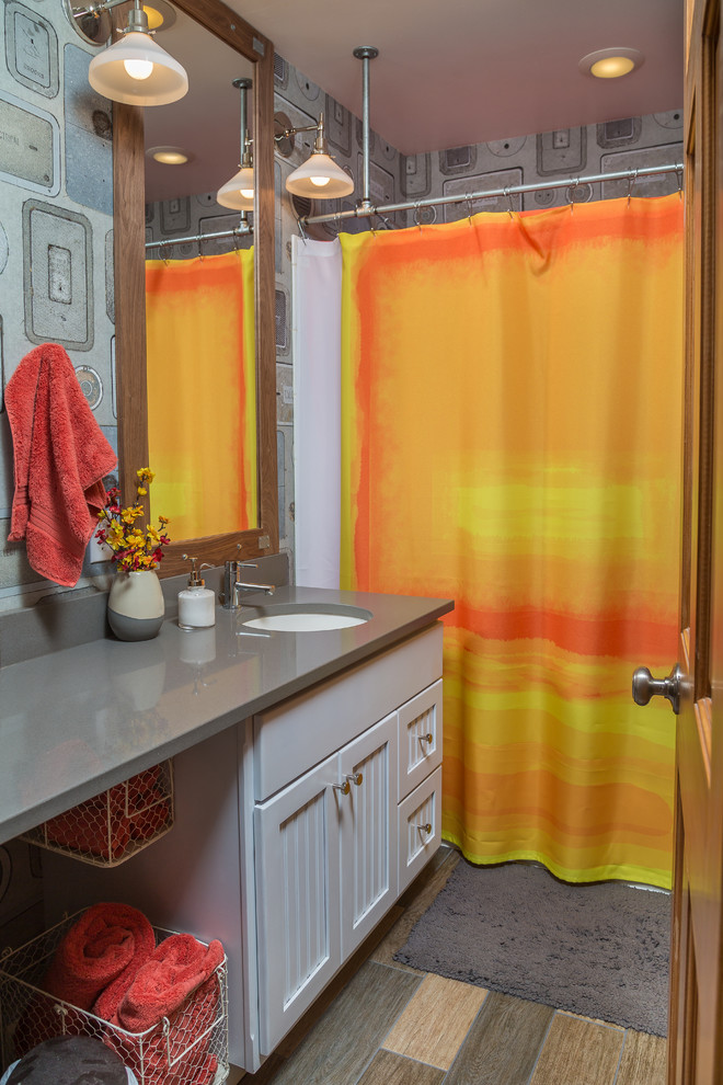 Mid-sized transitional 3/4 porcelain tile bathroom photo with an undermount sink, raised-panel cabinets, white cabinets and solid surface countertops