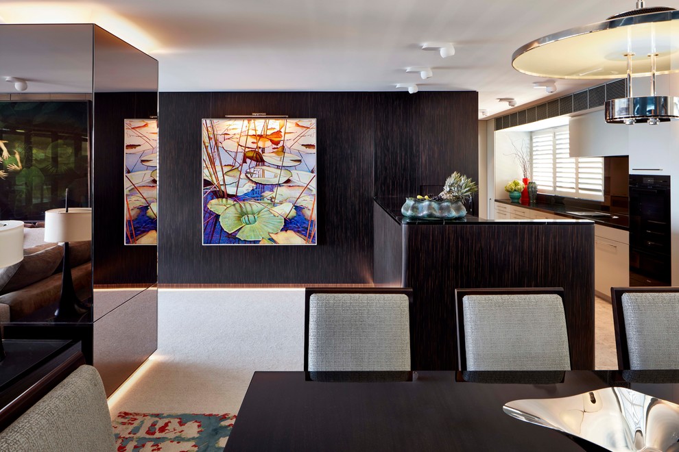 Design ideas for a mid-sized contemporary formal open concept kitchen/dining combo in Sydney with multi-coloured walls, carpet and multi-coloured floor.