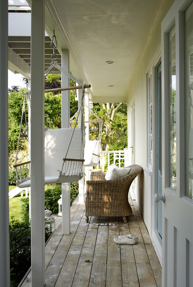 This is an example of a beach style verandah in London.