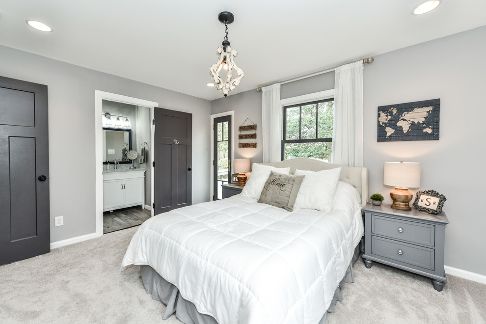 Design ideas for a mid-sized transitional master bedroom in DC Metro with grey walls, carpet, no fireplace and beige floor.