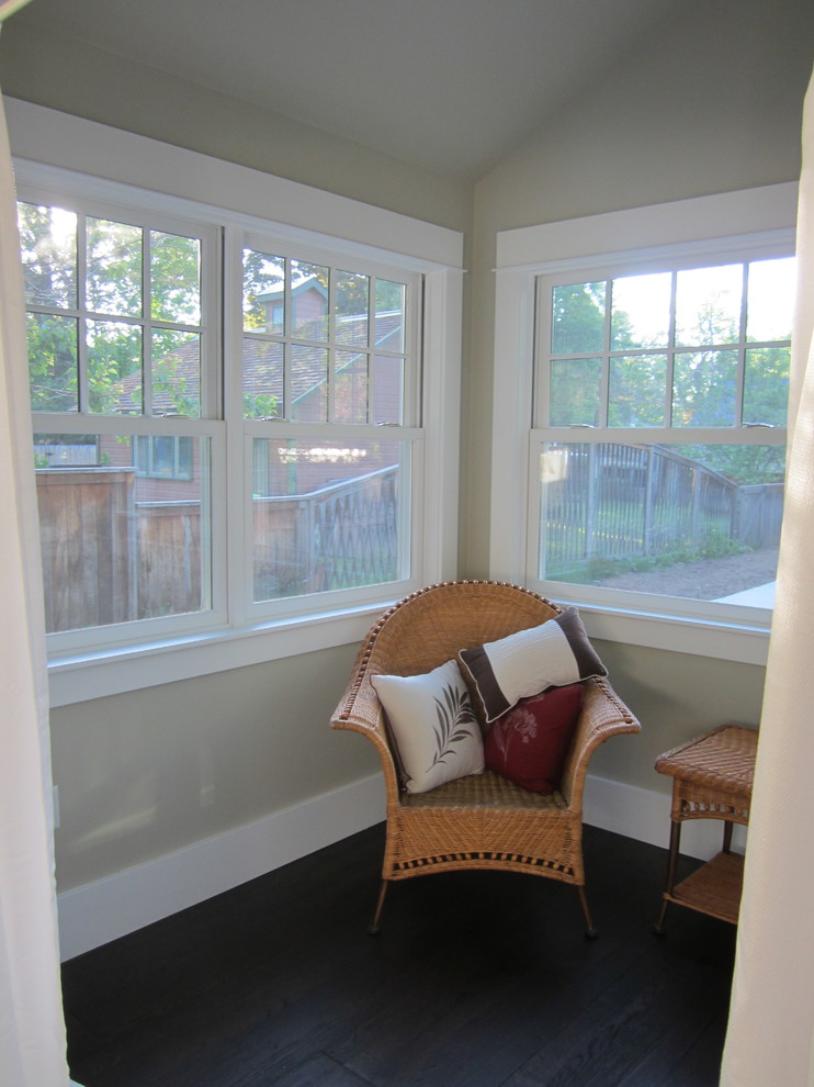 Small arts and crafts sunroom in Denver with dark hardwood floors, no fireplace and a standard ceiling.