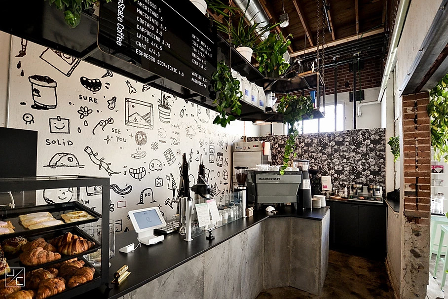 Home bar - industrial home bar idea in Denver