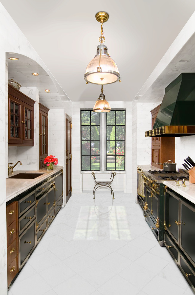 Design ideas for a mid-sized traditional galley separate kitchen in Austin with an undermount sink, marble benchtops, white splashback, stone tile splashback, marble floors, no island, glass-front cabinets, black appliances and white floor.
