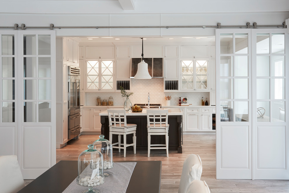 Kitchen - large transitional gray floor kitchen idea in Chicago with beaded inset cabinets, white cabinets, quartz countertops, ceramic backsplash and stainless steel appliances
