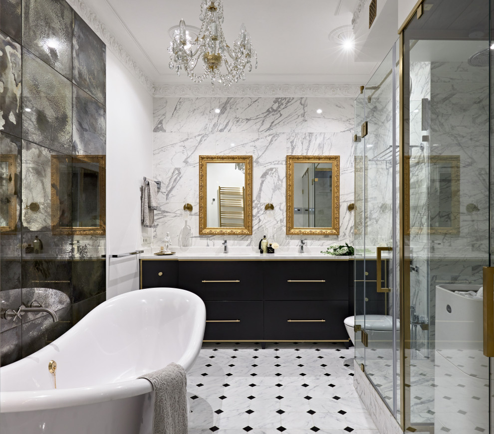 Large classic ensuite bathroom in Saint Petersburg with flat-panel cabinets, black cabinets, a freestanding bath, a wall mounted toilet, grey tiles, porcelain tiles, white walls, ceramic flooring, a submerged sink, solid surface worktops, grey floors, a hinged door, white worktops, double sinks and a floating vanity unit.
