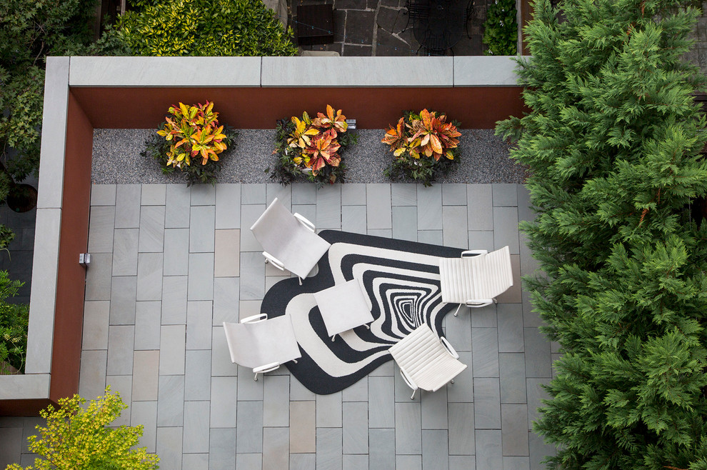 Inspiration for a midcentury patio in New York.