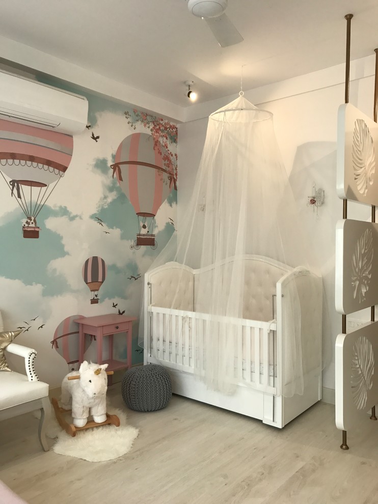 This is an example of a shabby-chic style nursery in Mumbai.