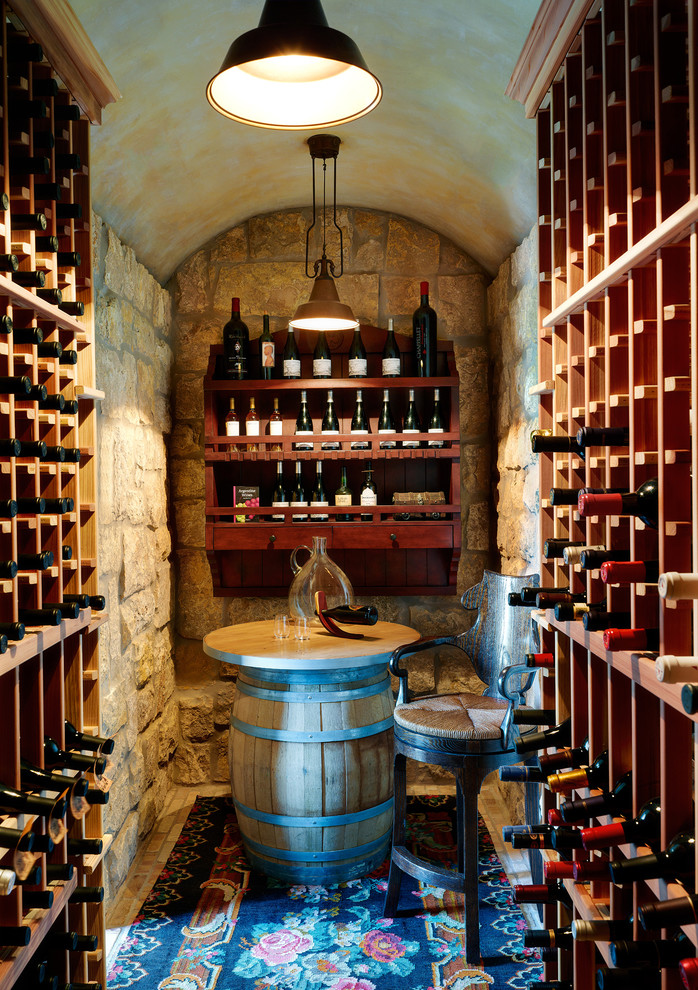 Design ideas for a transitional wine cellar in Phoenix.