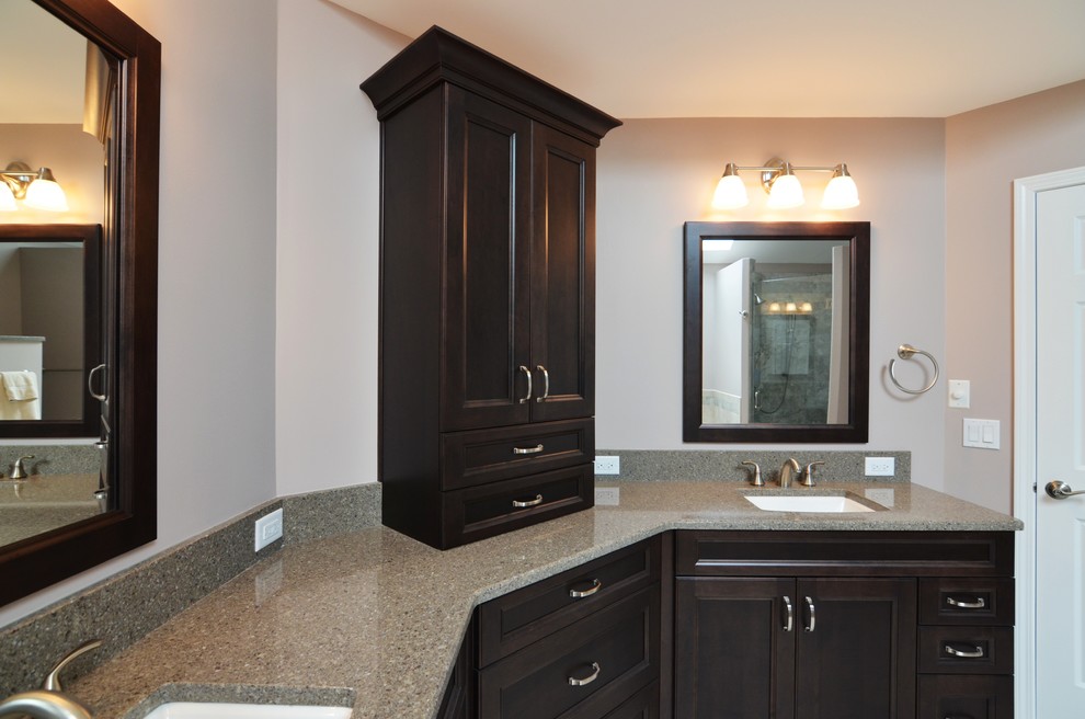 Drop-in bathtub - mid-sized transitional master beige tile and porcelain tile porcelain tile drop-in bathtub idea with recessed-panel cabinets, dark wood cabinets, a two-piece toilet, purple walls, an undermount sink and quartz countertops