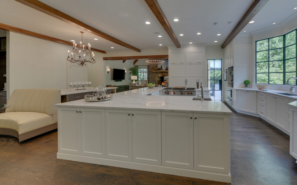 Design ideas for a large transitional u-shaped open plan kitchen in Atlanta with recessed-panel cabinets, grey cabinets, marble benchtops, marble splashback and multiple islands.