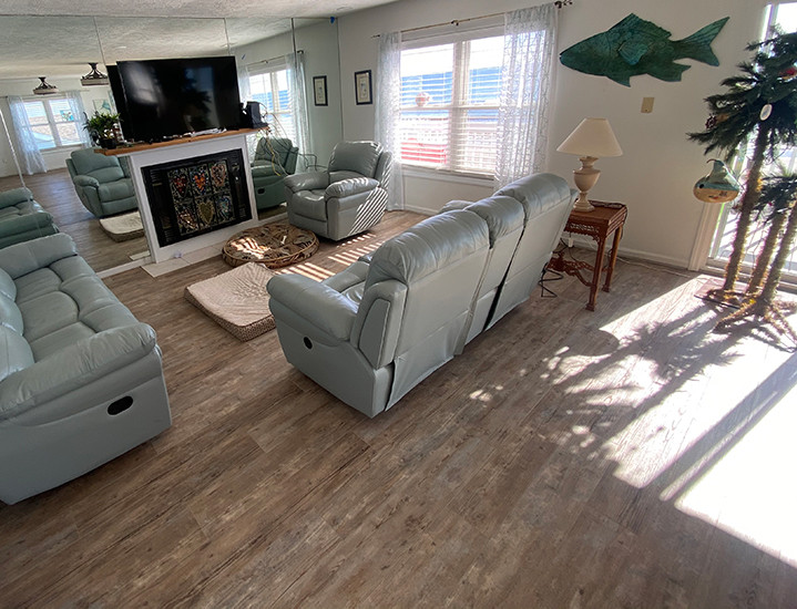 Nautical games room in Other with vinyl flooring and grey floors.
