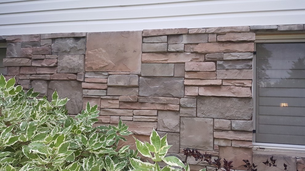 Adding to stone veneer. Better to try to match or to contrast?