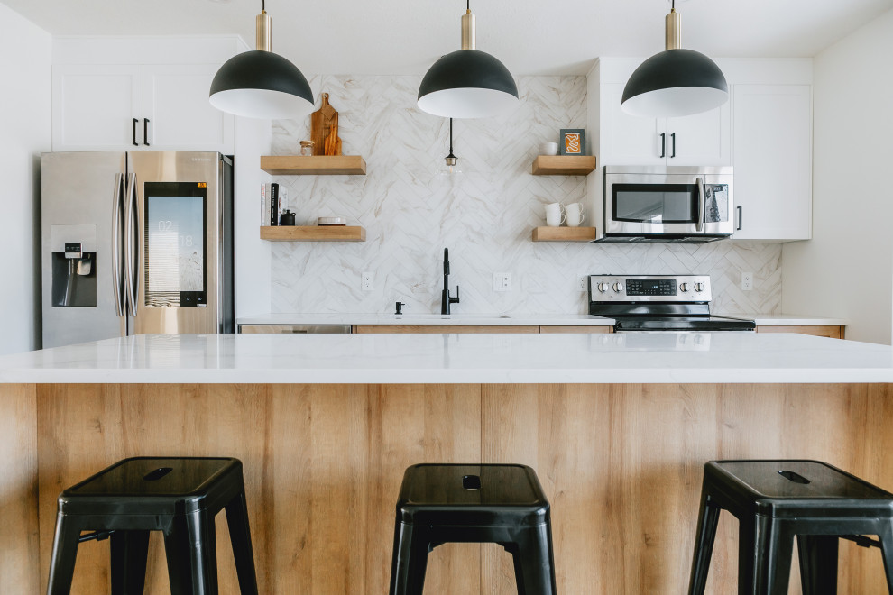 Example of a transitional kitchen design in Edmonton