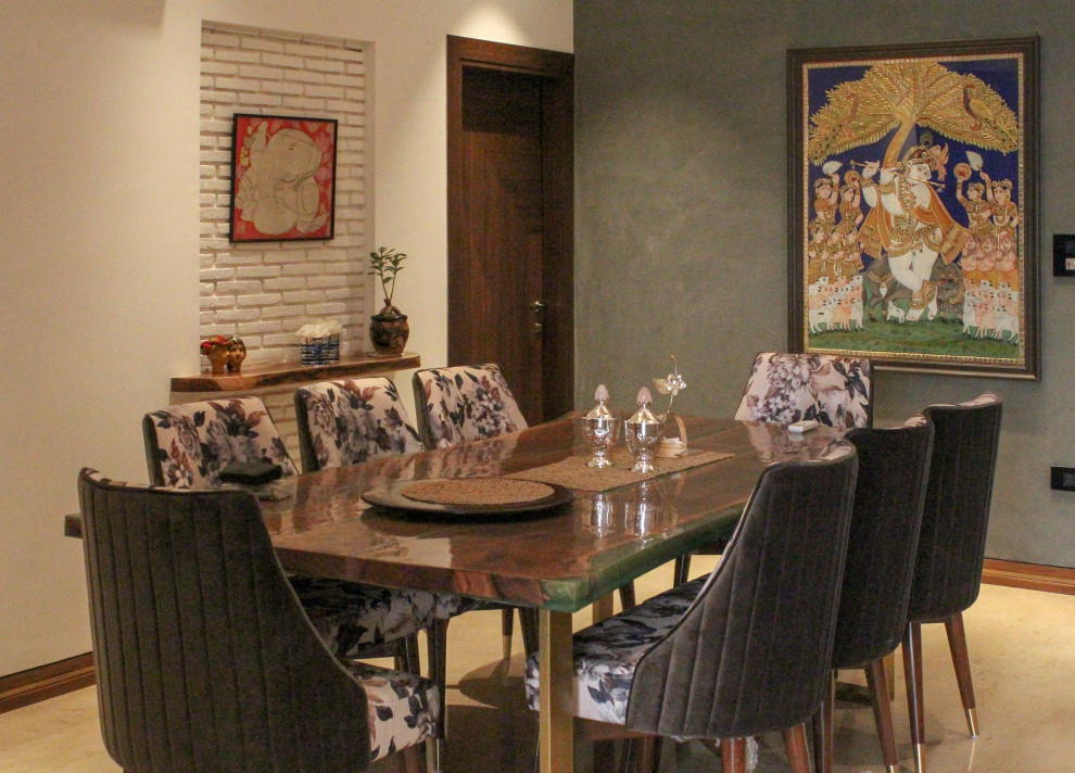 Photo of a transitional dining room in Delhi.