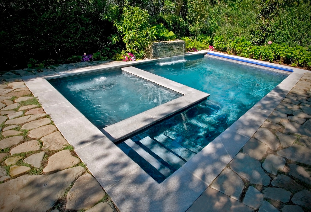 This is an example of a beach style pool in Boston.
